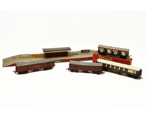 A quantity of Tri-Ang 00 Gauge trains, to include three LMS 27424 coaches, one LMS diesel car, two LMS 7573 coaches, one R23 
