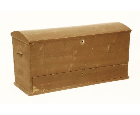 A brown painted dome top pine trunk, with an internal lidded box, over a drawer, 123cm