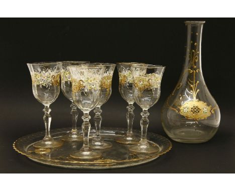 A glass decanter, glasses and tray set