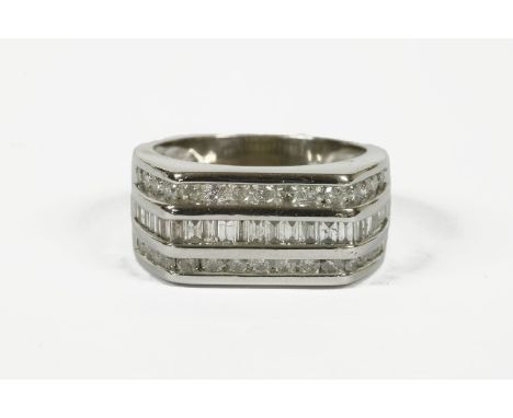 A 9ct white gold gentleman's diamond set ring, with an estimated total diamond weight of 1.69ct, finger size R9.05g approxima