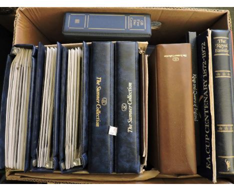 A quantity of stamps and First Day Covers in albums