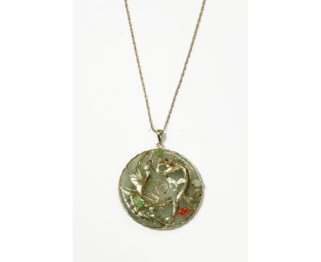 A 14ct gold jade bi pendant, with applied gold dragons, decoration gemstones, set with coral, opal and agate cabochons, on 14