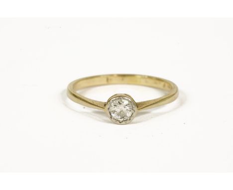 A gold single stone old cut diamond ring