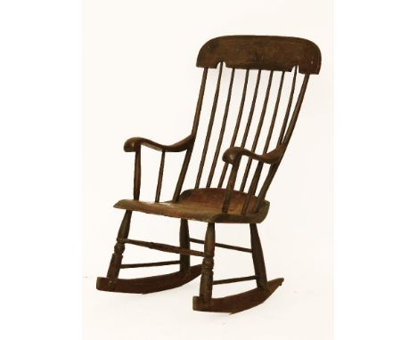 A 19th century painted stick back rocking chair