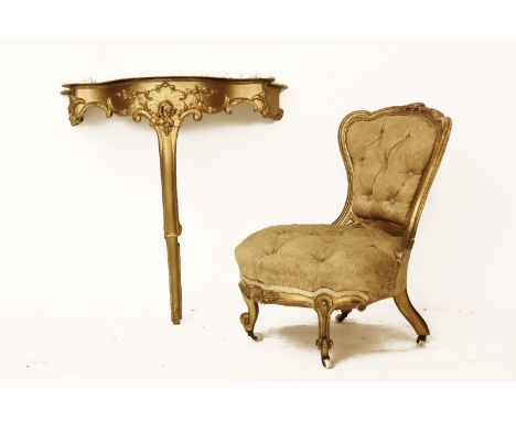 A gilt console table with a marble top, 75cm wide, and a gilt button upholstered low chair