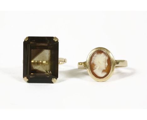 A 9ct gold emerald cut smokey quartz ring, size M, and a gold oval shell cameo ring, marked 14ctsmokey quartz 7.54gcameo 3.33