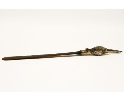 A silver mounted tortoiseshell page turner, the handle modelled as a Heron's head, 43cm long