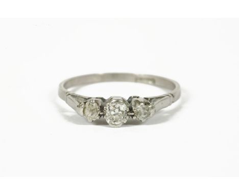 A three stone diamond ring, marked Plat, size N2.33g