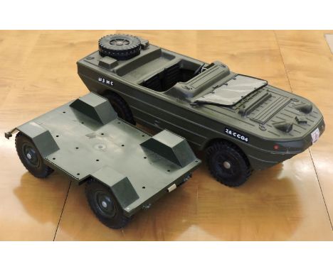 Action Man figures and equipment: diver, soldier, US army amphibious vehicle and trailer, clothing, weapons, etc