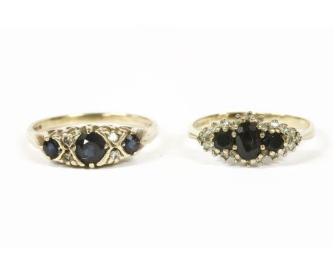 A 9ct gold graduated three stone sapphire with pairs of diamond set points ring, and a 9ct gold sapphire and diamond triple c