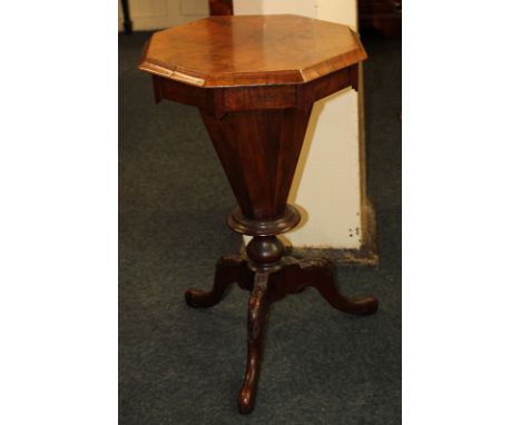 A Victorian walnut work table, faceted trumpet form with hexagonal top on tripod base, 41cm