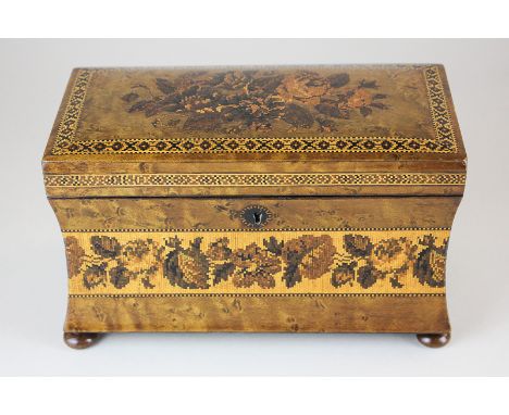 A 19th century Tunbridgeware tea caddy in birds eye maple with domed lid and concave sides, decorated with a floral design, e