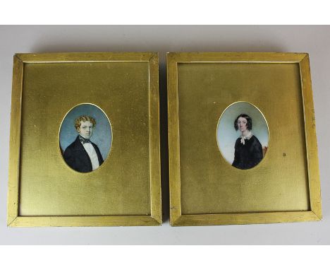 British school (early 19th century), a pair of oval portrait miniatures of a young gentleman and lady in gilt mounted frames,
