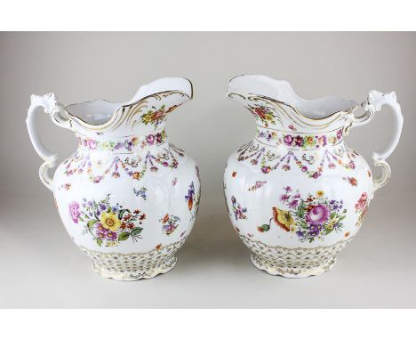 A pair of German Thuringia (possibly Plaue) large jugs, decorated in the Dresden/Meissen style with floral sprays and gilt em