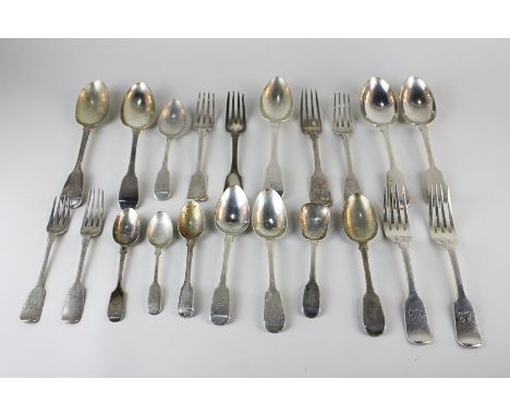 A collection of George III and later silver fiddle pattern flatware dating from 1811, including three basting spoons, four de