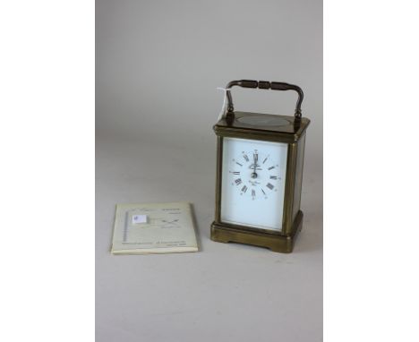 A L'Epee brass and bevelled glass cased carriage clock, the white enamel dial with Roman numerals marked L'Epee, fondee 1839,