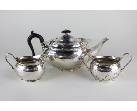 A George V silver three piece tea set with oval form, maker William Hutton & Sons Ltd, Sheffield 1927, 27.5oz gross