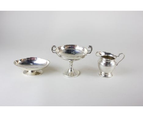 A George V silver tazza, maker Walker and Hall, Sheffield 1914, a Mappin & Webb silver cream jug, Birmingham 1923, and a W H 