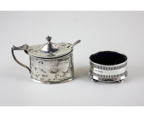 An Edward VII silver mustard  with blue glass liner and associated spoon, maker Haseler Brothers, Chester 1904, together with