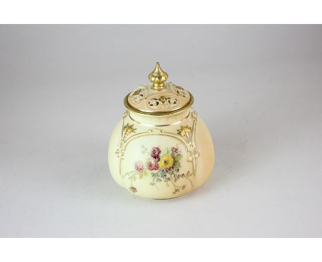 A Royal Worcester porcelain pot pourri jar and cover with hand painted floral design and gilt embellishment on blush ivory gr