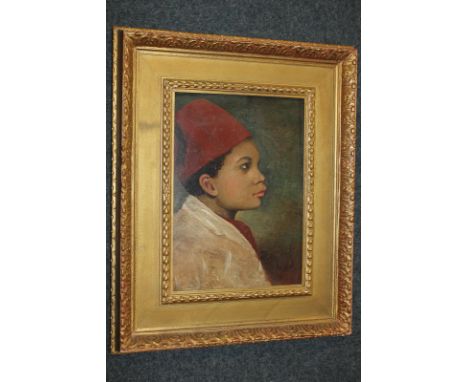 19th century school, portrait of a young boy in profile wearing a fez and white robe, oil on panel, 38cm by 27cm