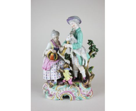 A Dresden porcelain Meissen style figure group of a lady with a parrot, a man with a goat and a monkey at their feet (a/f - r