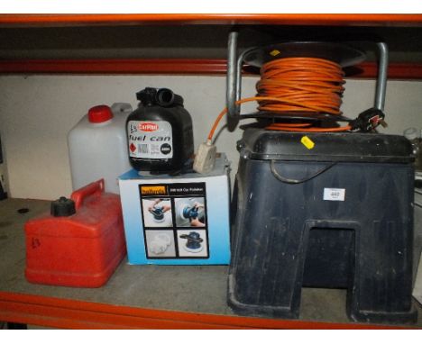 A STOOL TOOLBOX WITH AN EXTENSION LEAD, FUEL CANS & A HALFORDS CAR POLISHER