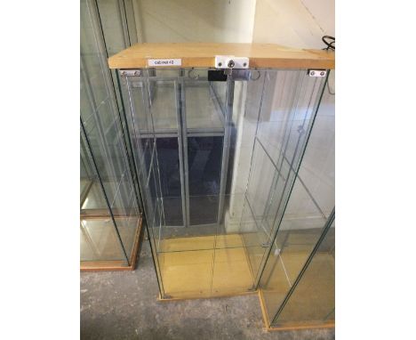 A TWO SHELF DISPLAY CABINET