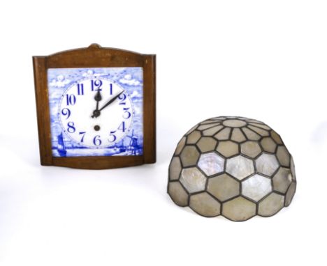 A wall clock and a ceiling light