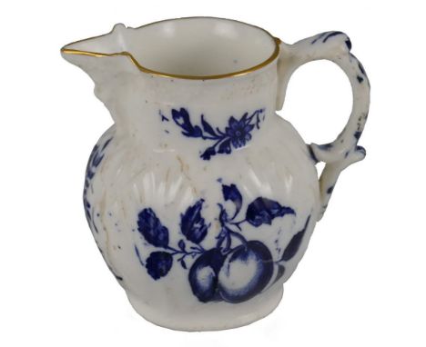 An early 19th century English porcelain jug, the leaf moulded bulbous body with mask spout and fruiting vine moulded border, 