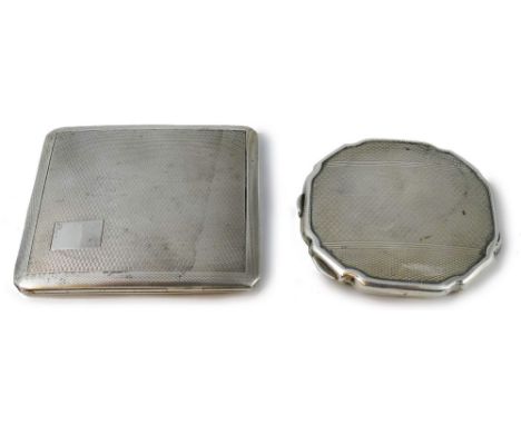 A silver compact case, Birmingham 1945, of circular form with engine turned decoration and a silver cigarette case, Birmingha