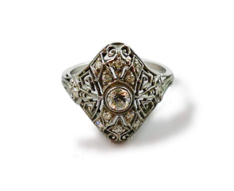 An American Art Deco diamond panel ring, circa 1925, milligrain collet set with an old cut brilliant stone, weighing approxim