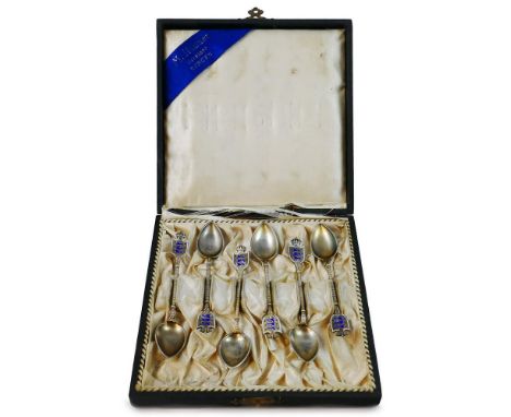 A Norwegian set of six .900 standard silver gilt and enamel coffee spoons, by Marius Hammer, Bergen circa 1910, the terminals