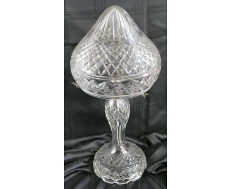 A clear glass table lamp base and shade, with all-over deep cut hatching and star decoration, the hollow baluster stem with d