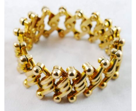 A Victorian 15ct gold Baden patent expanding bracelet, composed of woven links, weight 16 grams.