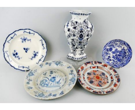 A 19th century pearlware plate, of shaped circular form painted in blue and white with flowers and swags 24.5cm diameter, a D