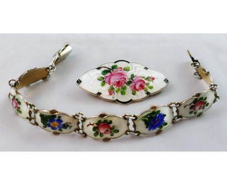 Ivar Holt - a Norwegian silver gilt and enamel bracelet, composed of eight white guilloché panels decorated with different fl