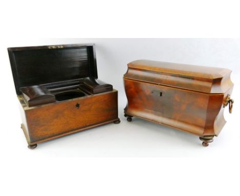 A 19th century mahogany tea caddy, of sarcophagus shape, the slightly domed hinged lid with canted corners and satinwood cros