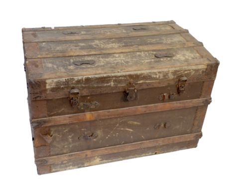 A large early 20th century metal bound domed top trunk with wooden slats, height 67cm, length 102cm, depth 61cm (af).Addition