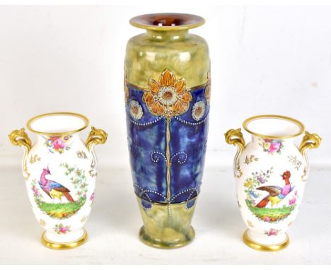 SPODE COPELANDS CHINA; a pair of gilt heightened twin handled vases decorated with floral sprays and exotic birds, printed ma