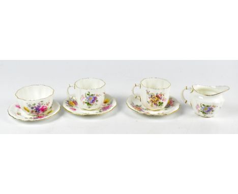 ROYAL CROWN DERBY; a 'Derby Posies' pattern part tea service comprising two saucers, one side plate, two cups, sugar bowl and