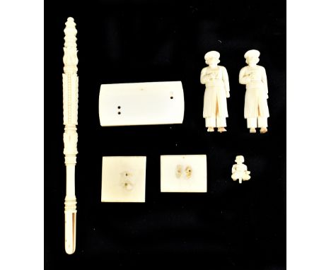 A late 19th century Chinese Canton carved ivory handle for a fan, length 20.5cm, and a pair of late 19th century Indian carve