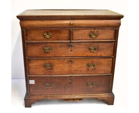 A George III oak chest with frieze drawer above two short and three long drawers on ogee bracket feet, height 104cm, width 10