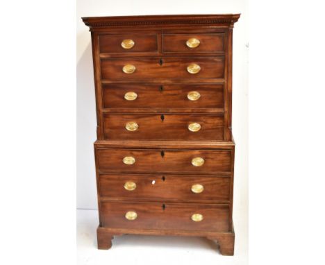 A George III mahogany chest on chest, the upper section with dentil moulded cornice above two short and three long drawers, t