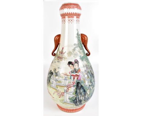 A good Chinese Republic period porcelain vase with onion bulb neck above twin elephant trunk moulded handles and baluster bod