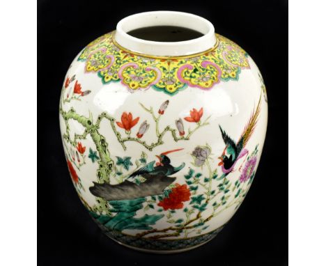 A late 19th century Chinese Famille Verte vase of bulbous form, painted with stylised birds in landscape setting, bears four 