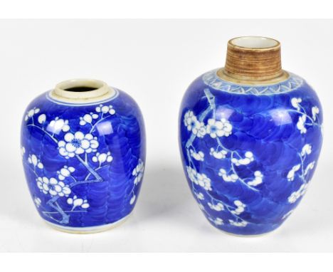 An early 20th century Chinese blue and white jar with painted four character marks to base, height 10cm, and a similar exampl