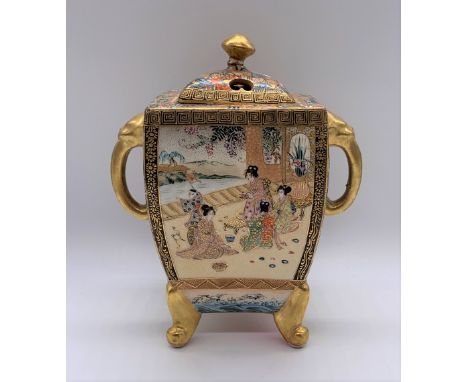 A Japanese Meiji period Satsuma koro of rectangular form with pierced cover above twin elephant trunk moulded handles and pan