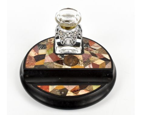 A 19th century specimen marble and stone on slate desk stand of circular form, with later glass inkwell, diameter 22.5cm.Addi