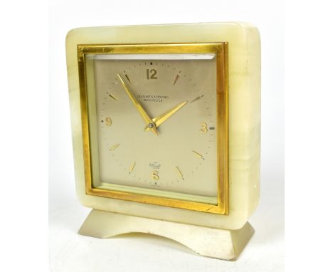 ELLIOTT; a 1950s onyx mantel clock retailed by Ollivant &amp; Botsford, height 15cm.Additional InformationMinor nibbles to th